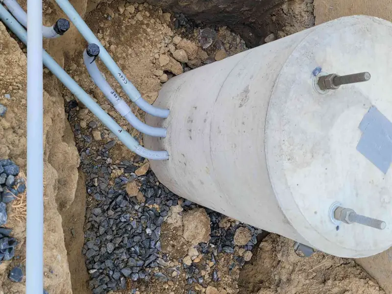 Precast base with labelled conduit for loop, CCTV and power
